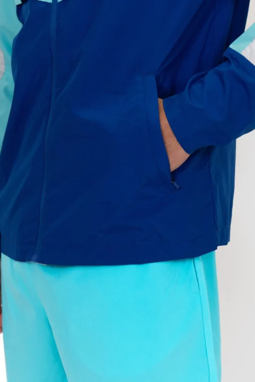 Breeze 2.0 Windbreaker - Light Smoke Grey/Neon Sky/Marine Blue 13 Breeze 2.0 Windbreaker - Light Smoke Grey/Neon Sky/Marine Blue -Urban Sport Wear Store BREEZE 2.0 WINDBREAKER MICROCHIP BLUEFISH SODALITE BLUE Sleeve Detail scaled