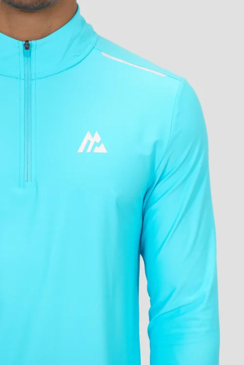 Charge 2.0 1/4 Zip - Neon Sky -Urban Sport Wear Store CHARGE 2.0 1 4 ZIP BLUEFISH Logo Detail inc Zipv3 scaled