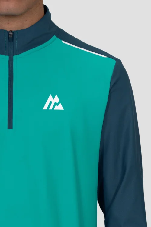 Charge 2.0 1/4 Zip - Aruba/Abyssal -Urban Sport Wear Store Charge 1 4 Zip LAPIS SAILOR BLUE Logo close up Inc reflective detail and Zip scaled