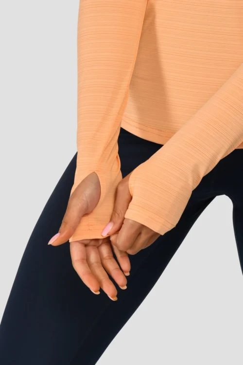 Women's Draft 1/4 Zip - Sunset Peach -Urban Sport Wear Store DRAFT 1 4 ZIP SUNSET PEACH sleeve detail scaled
