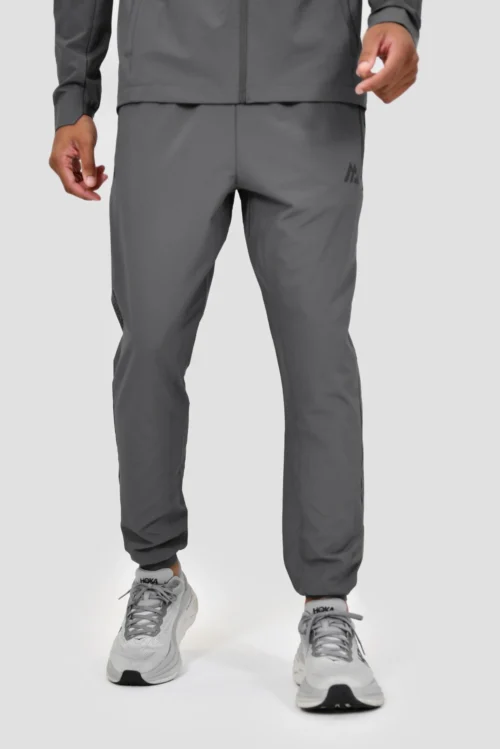 Lumos Woven Pant - Cement Grey -Urban Sport Wear Store LUMOS PANT CEMENT GREY ASPHALT close front scaled